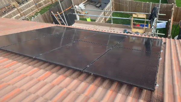 Panels on a tiled roof, from the scaffold