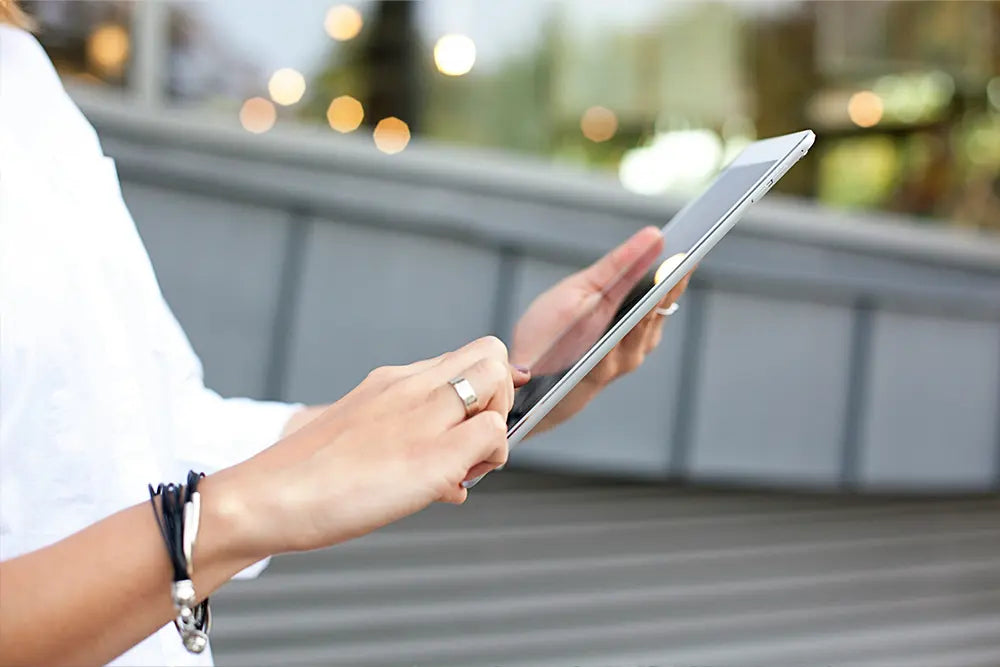A homeowner reading through a quote on a tablet