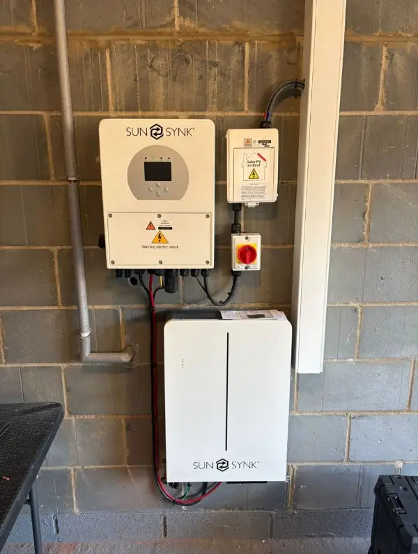 SunSynk inverter and battery in a garage