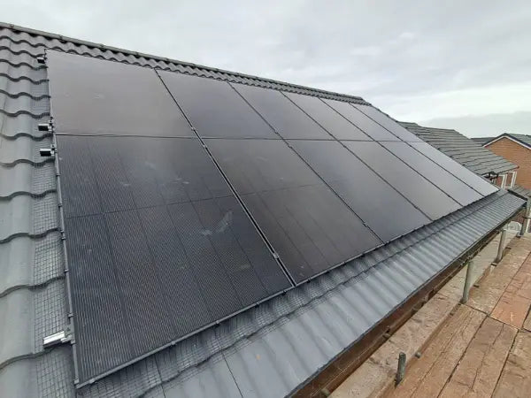 Panels across a grey tiled roof