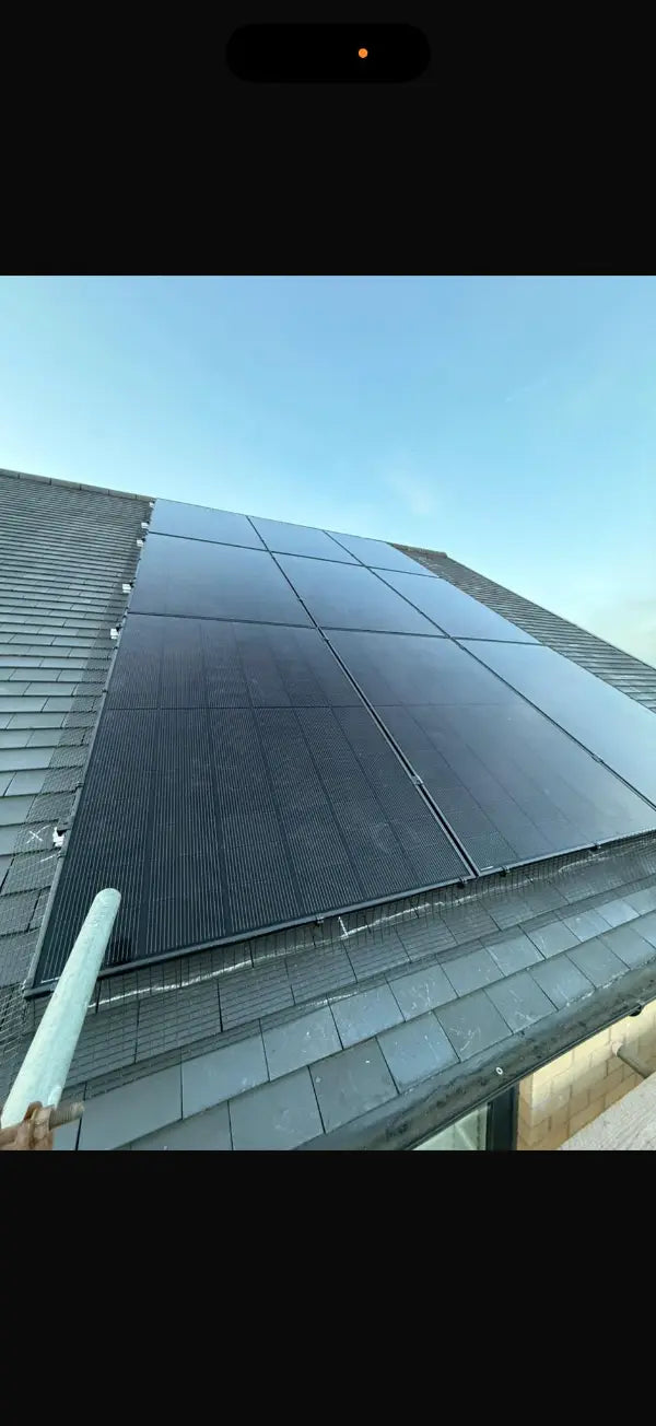 All-black panels on a slate roof, close up